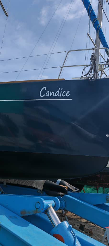 The Candice name hand-painted on the hull of our Beneteau Oceanis 45